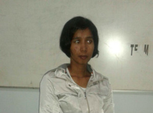 Foto : Tersangka Ma saat di Kantor Polsek Rumbai, Pekanbaru. (sgn)